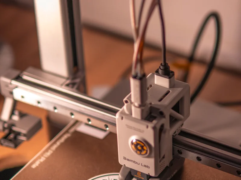 A 3D printer making a personalised piece in the Dexterly workshop